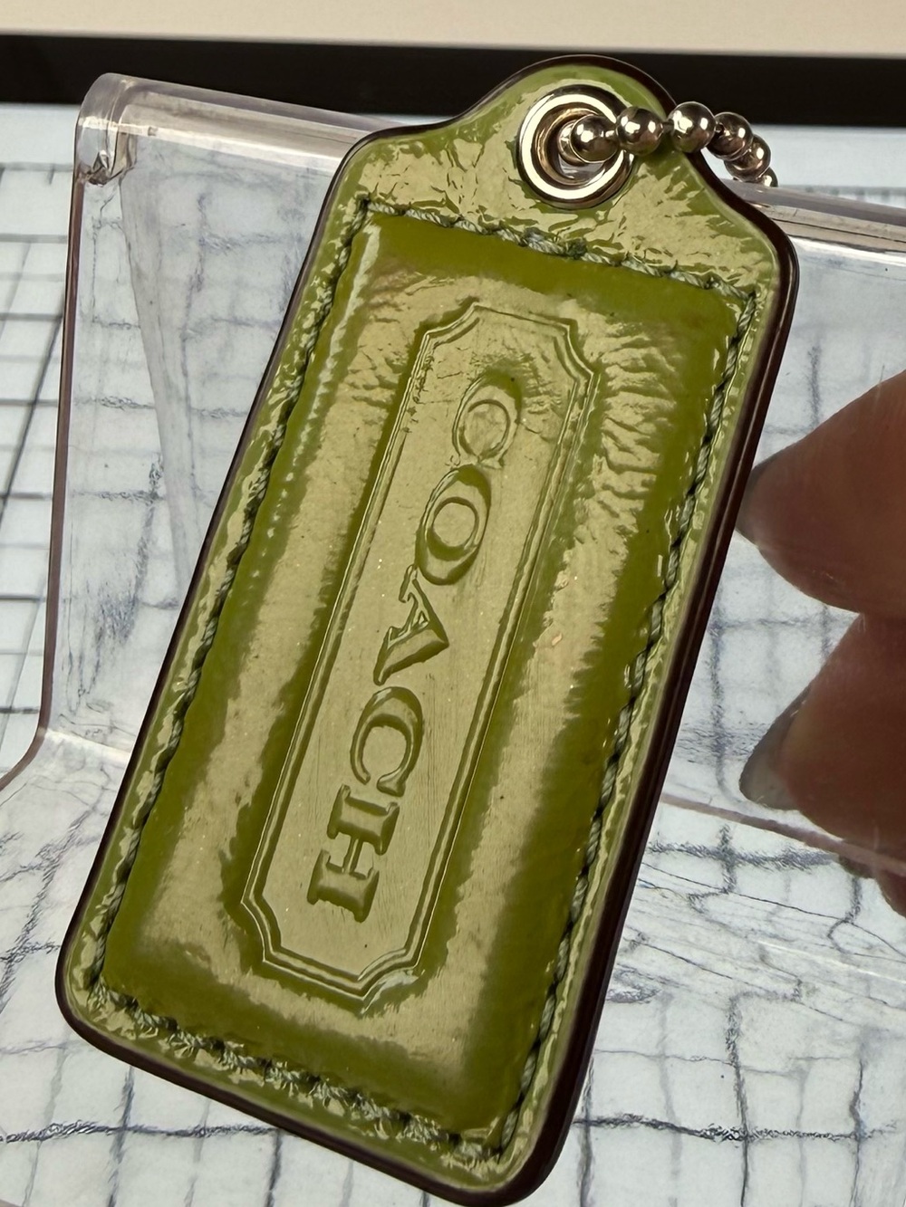 Coach Olive Green Patent Leather Hangtag Keychain with Ball Chain. 2.5 by 1.25